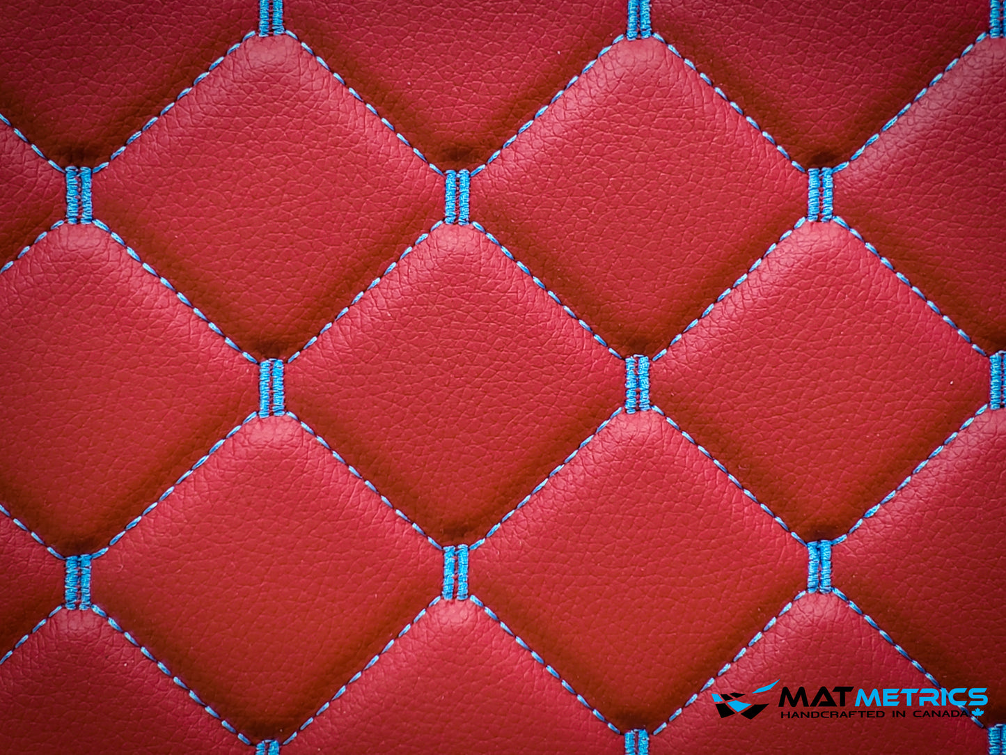 Close-up of the car mat leather material - Cubic Series, Red/Blue Stitching