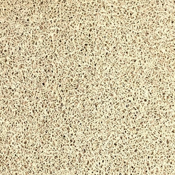 Close-up of the detachable vinyl carpet material, beige colour