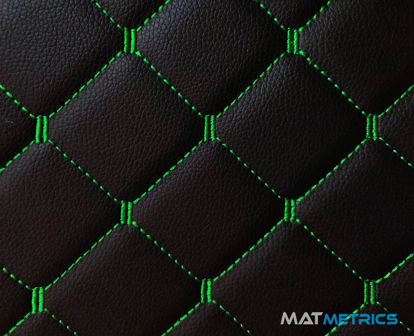 Close-up of the car mat leather material - Cubic Series, Black/Green Stitching