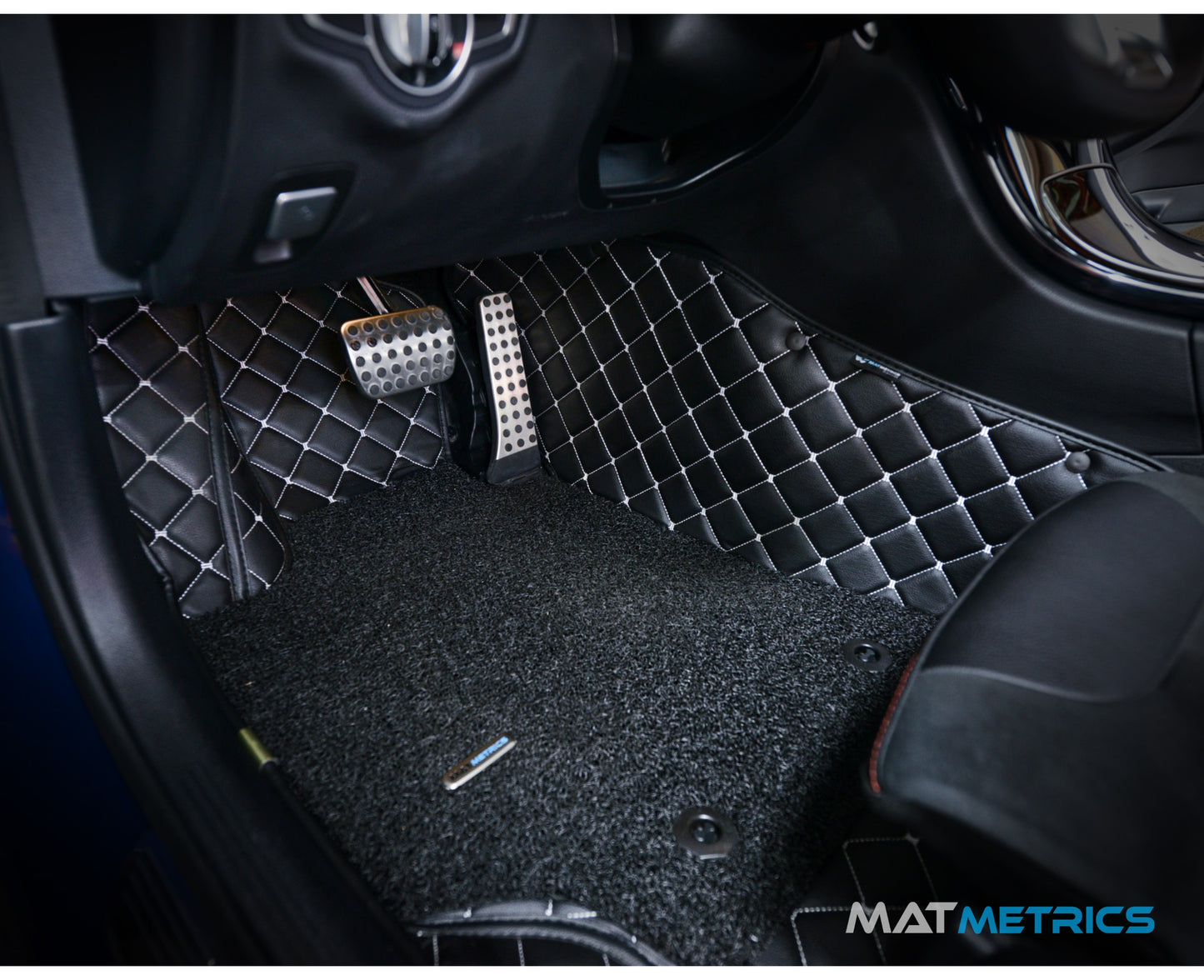 Mat Metrics car mats installed on a Canadian Car; product: Cubic Series Black/White Stitching with Black Detachable Vinyl Insert
