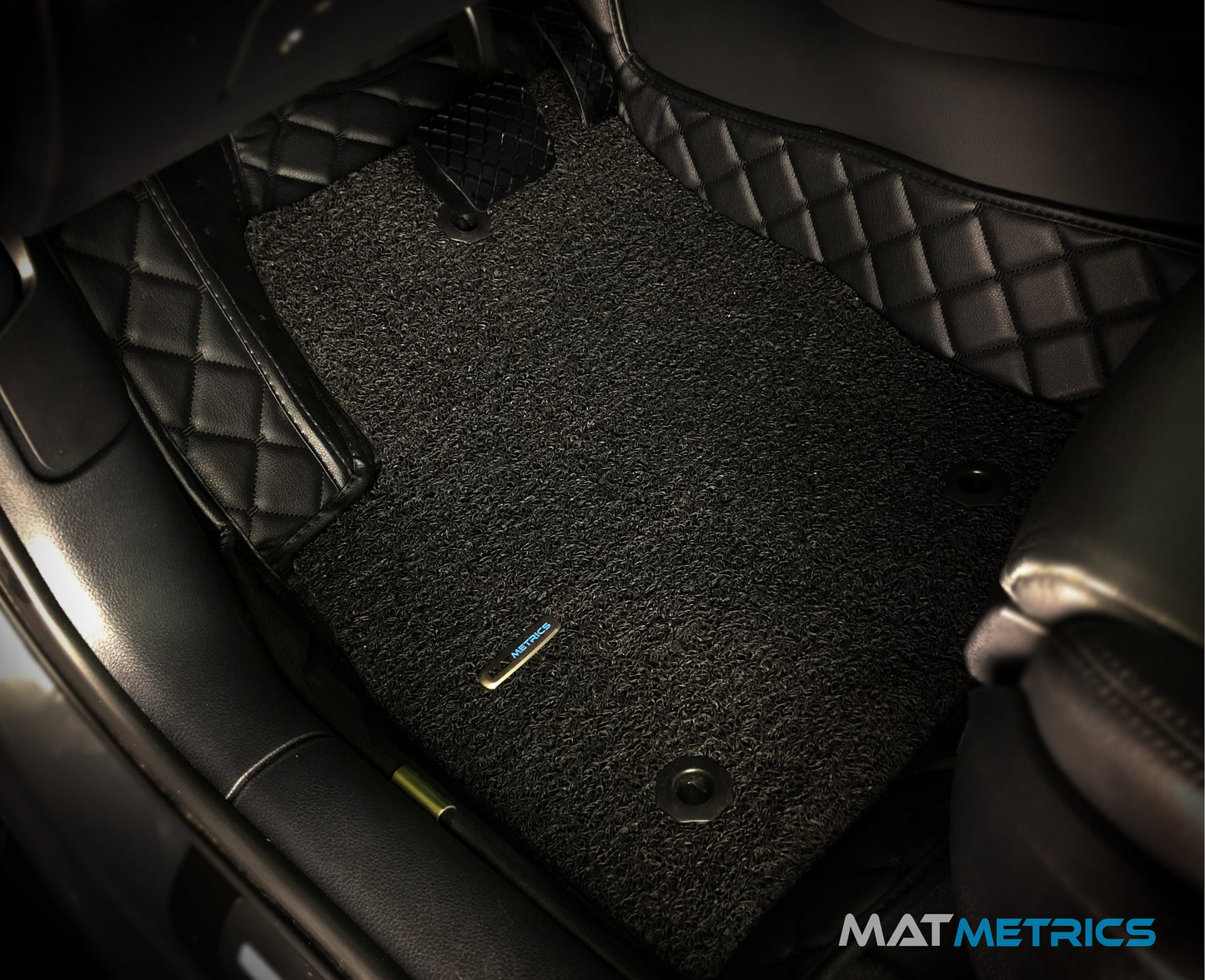 Mat Metrics car mats installed on a Canadian Car; product: Cubic Series Black/Black Stitching with Black Detachable Vinyl Insert