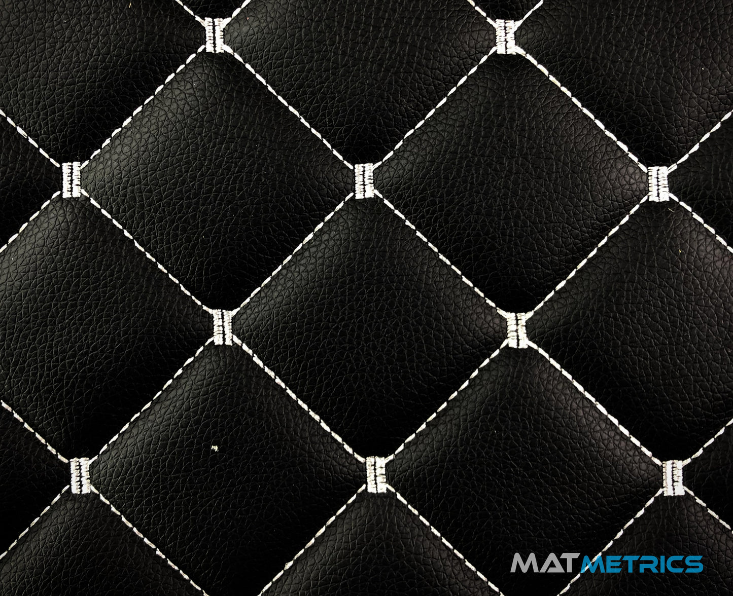 Close-up of the car mat leather material - Cubic Series, Black/White Stitching
