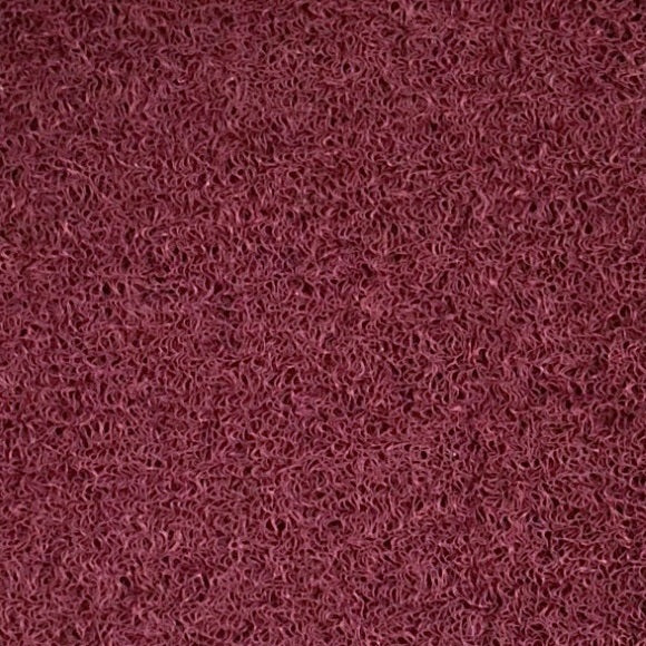 Close-up of the detachable vinyl carpet material, maroon colour